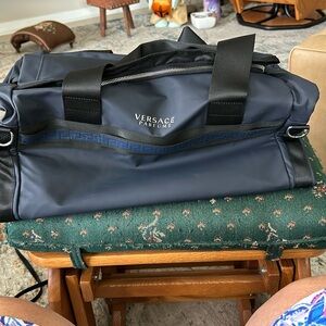Versace Parfums blue travel bag travel weekender approximately 18” x 10”